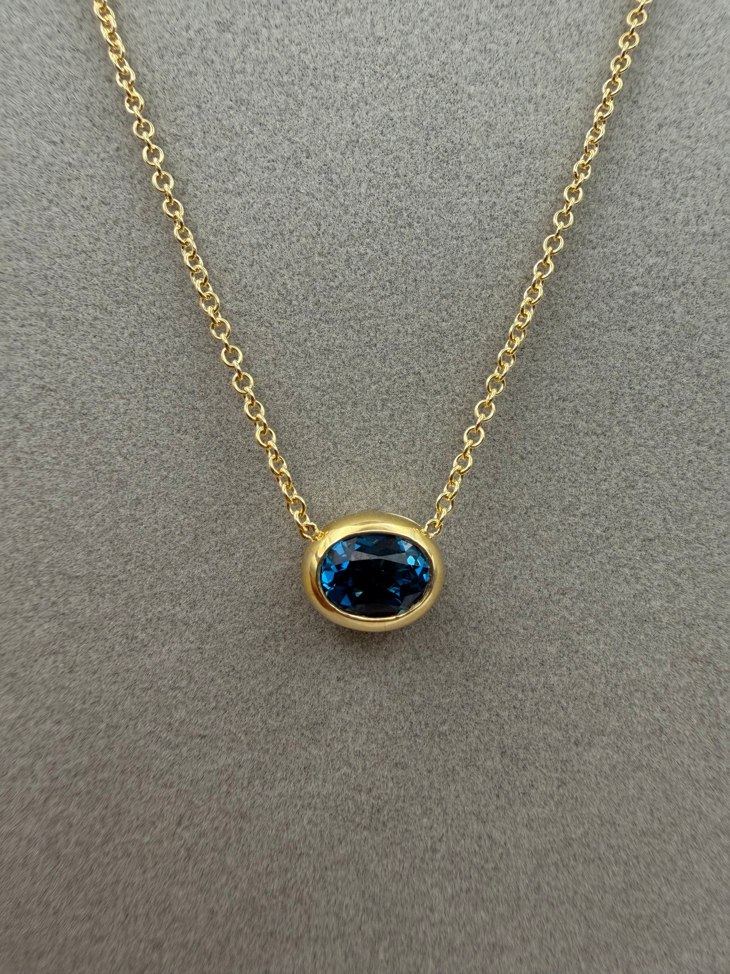 Collana Fiore in oro e Topazio London