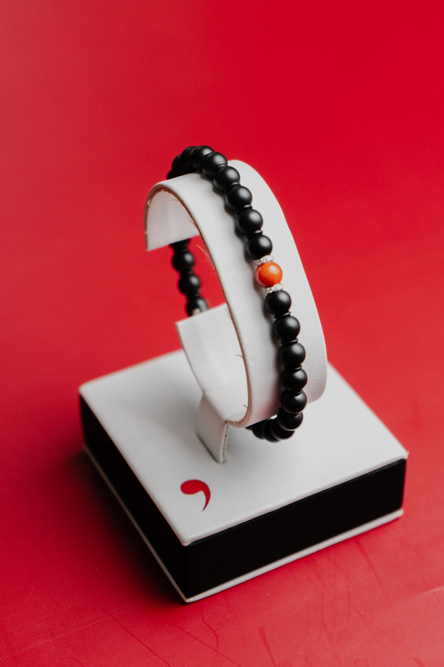 Bracciale Roberto Demeglio in ceramica nera lucida, corallo e oro bianco