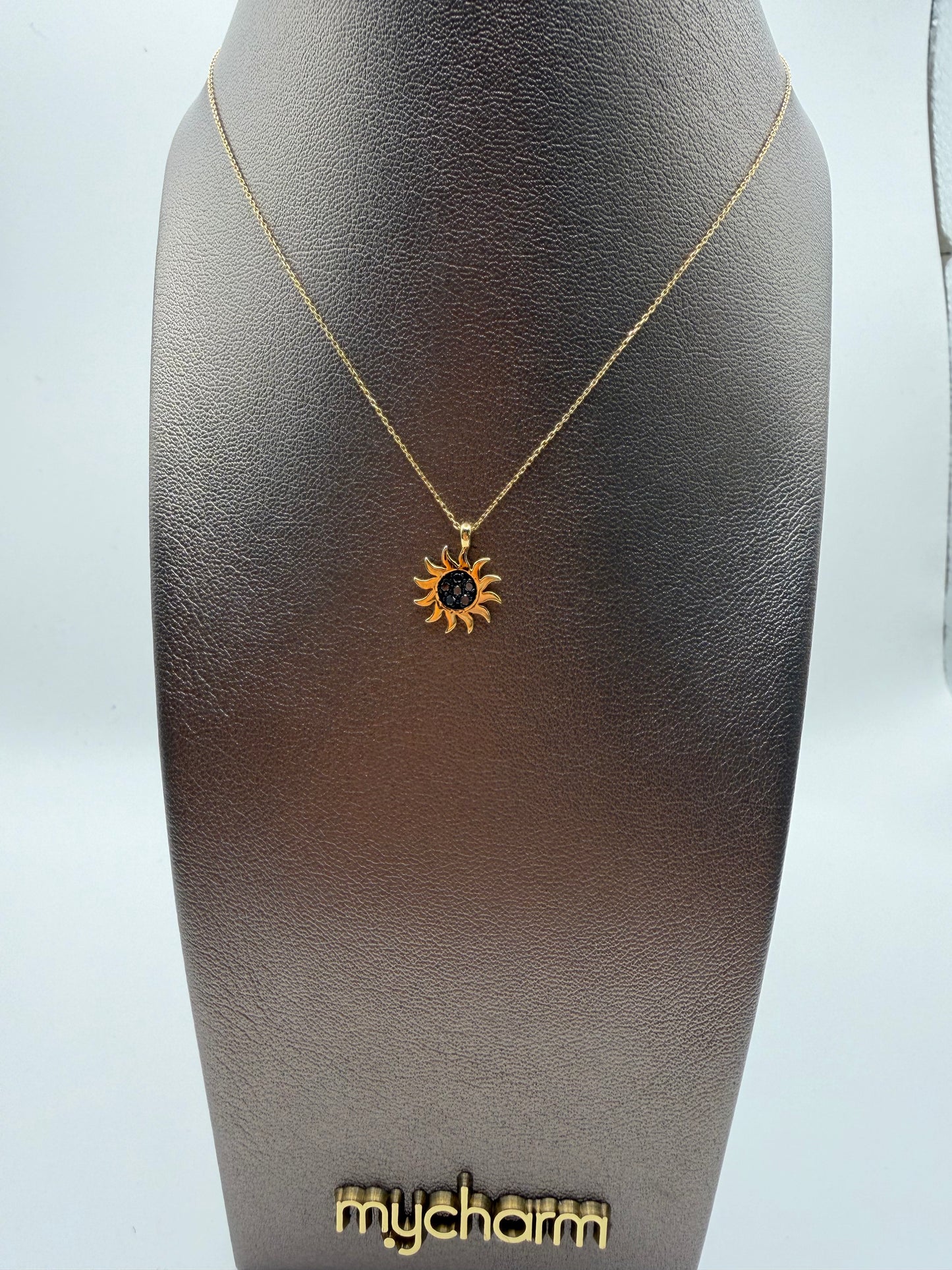 Collana MyCharm in oro con ciondolo sole e diamanti neri