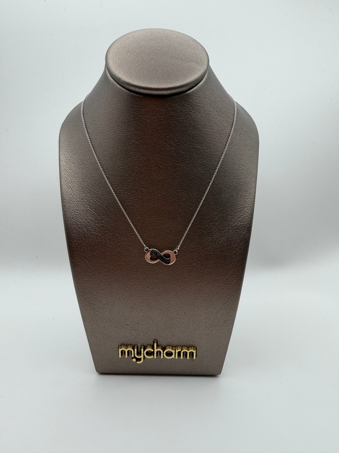 Collana MyCharm in oro con ciondolo infinito e diamanti neri