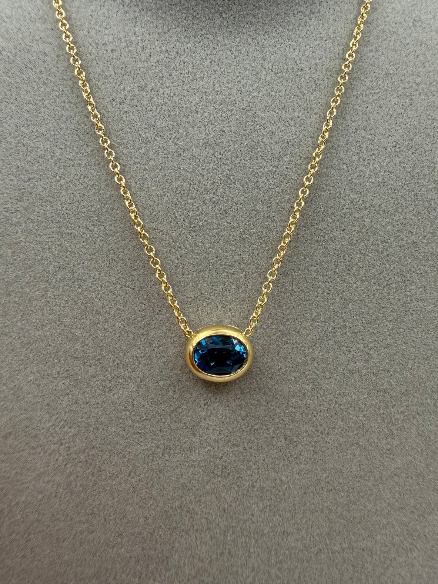 Collana Fiore in oro e Topazio London