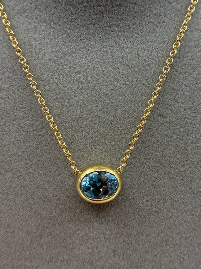 Collana Fiore in oro e Topazio Sky