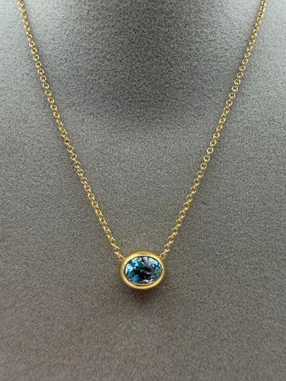 Collana Fiore in oro e Topazio Sky