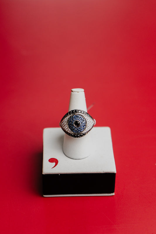 Anello Roberto Demeglio in oro bianco, diamanti bianchi, diamanti neri e zaffiri blu
