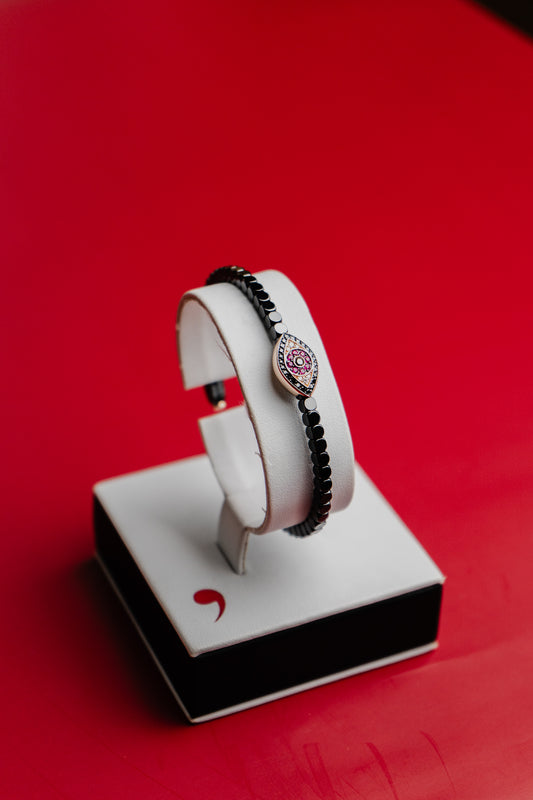 Bracciale Roberto Demeglio in ceramica nera lucida simbolo occhio in rubini, diamanti neri e bianchi su oro rosa