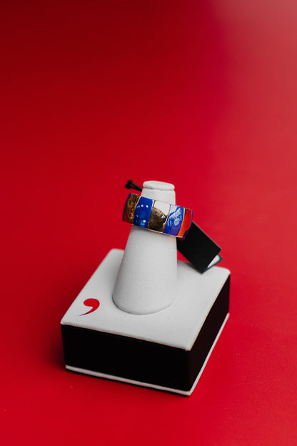 Anello Roberto Demeglio in ceramica blu e dorata